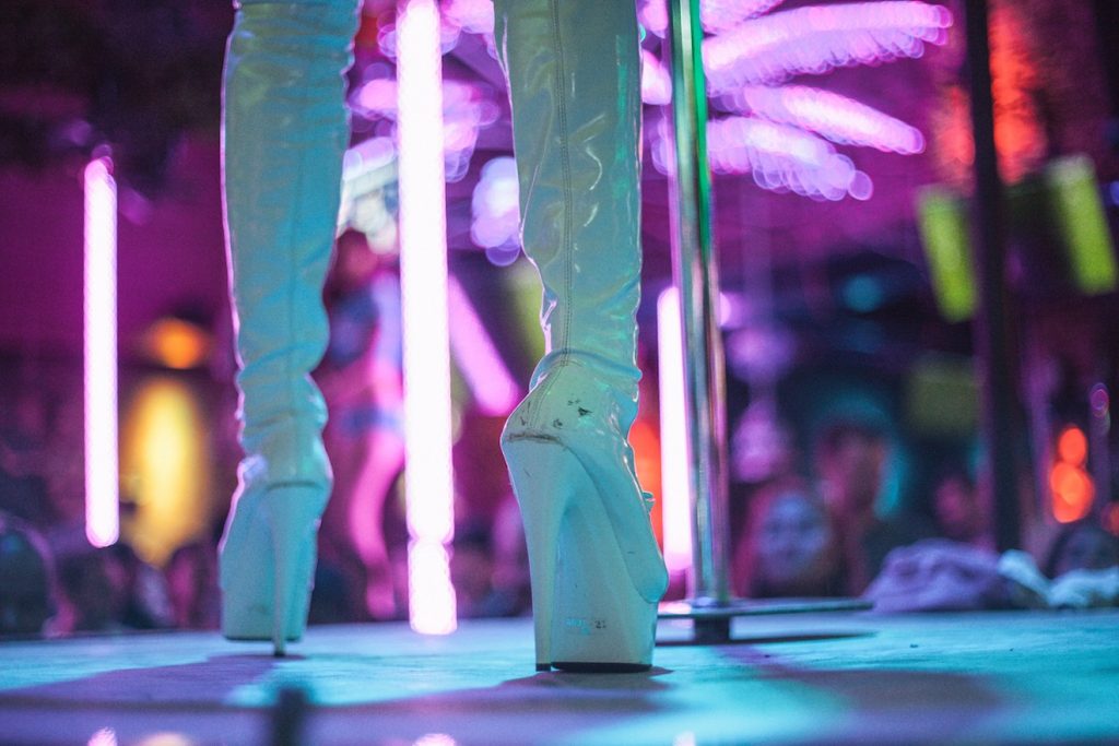 Why strip clubs Charge a cover Charge 